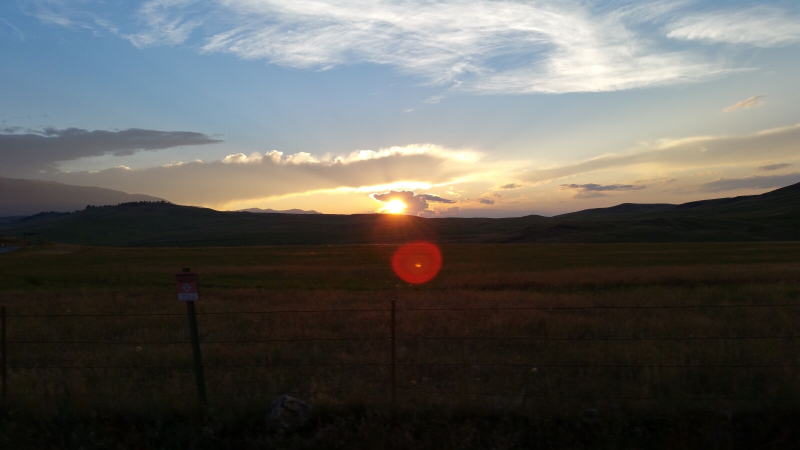 Samsung Galaxy Note4 sample photo. Clouds, fence, montana, sky photography