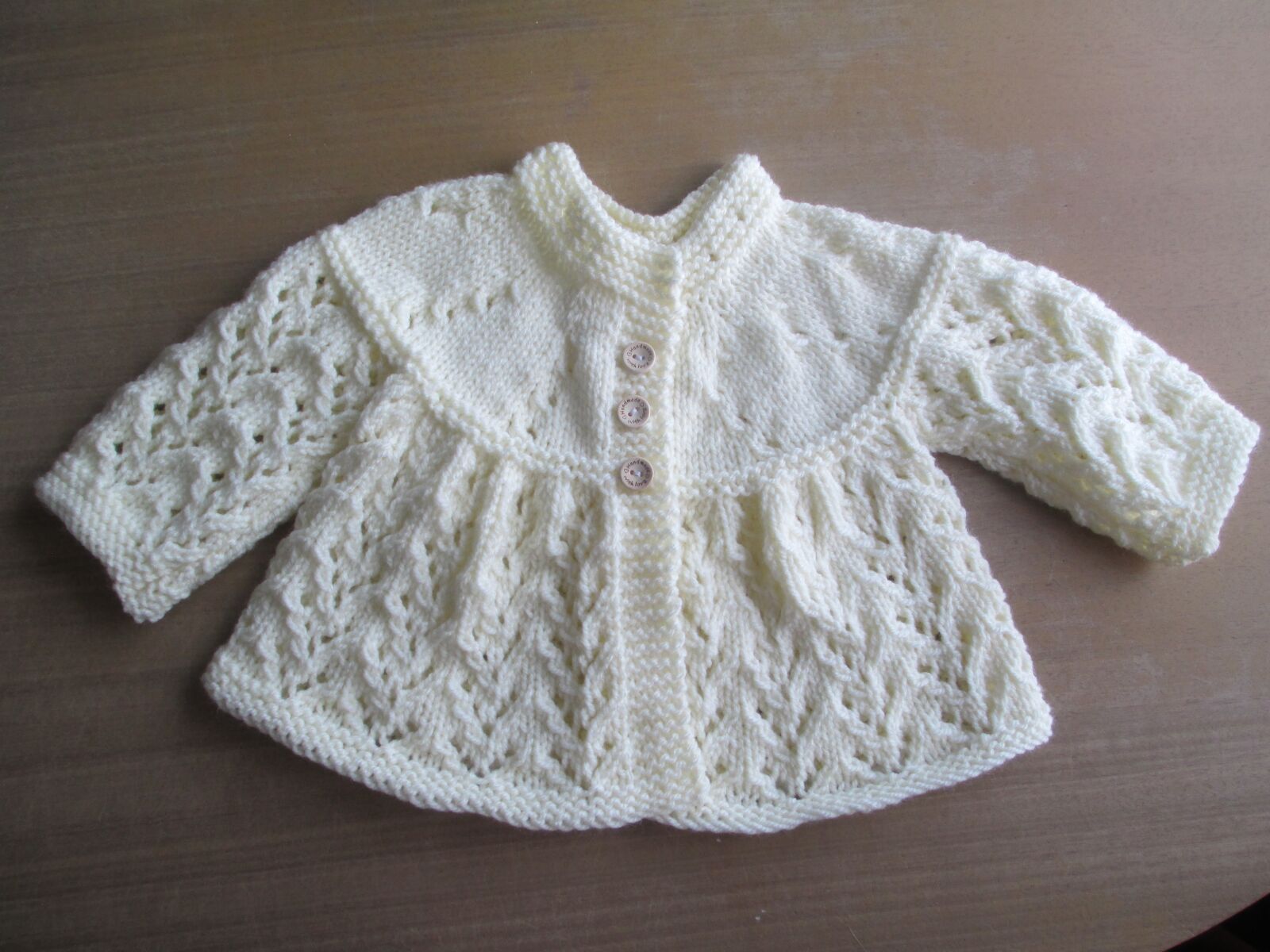 Canon PowerShot A4000 IS sample photo. Baby, cardigan, knitted photography