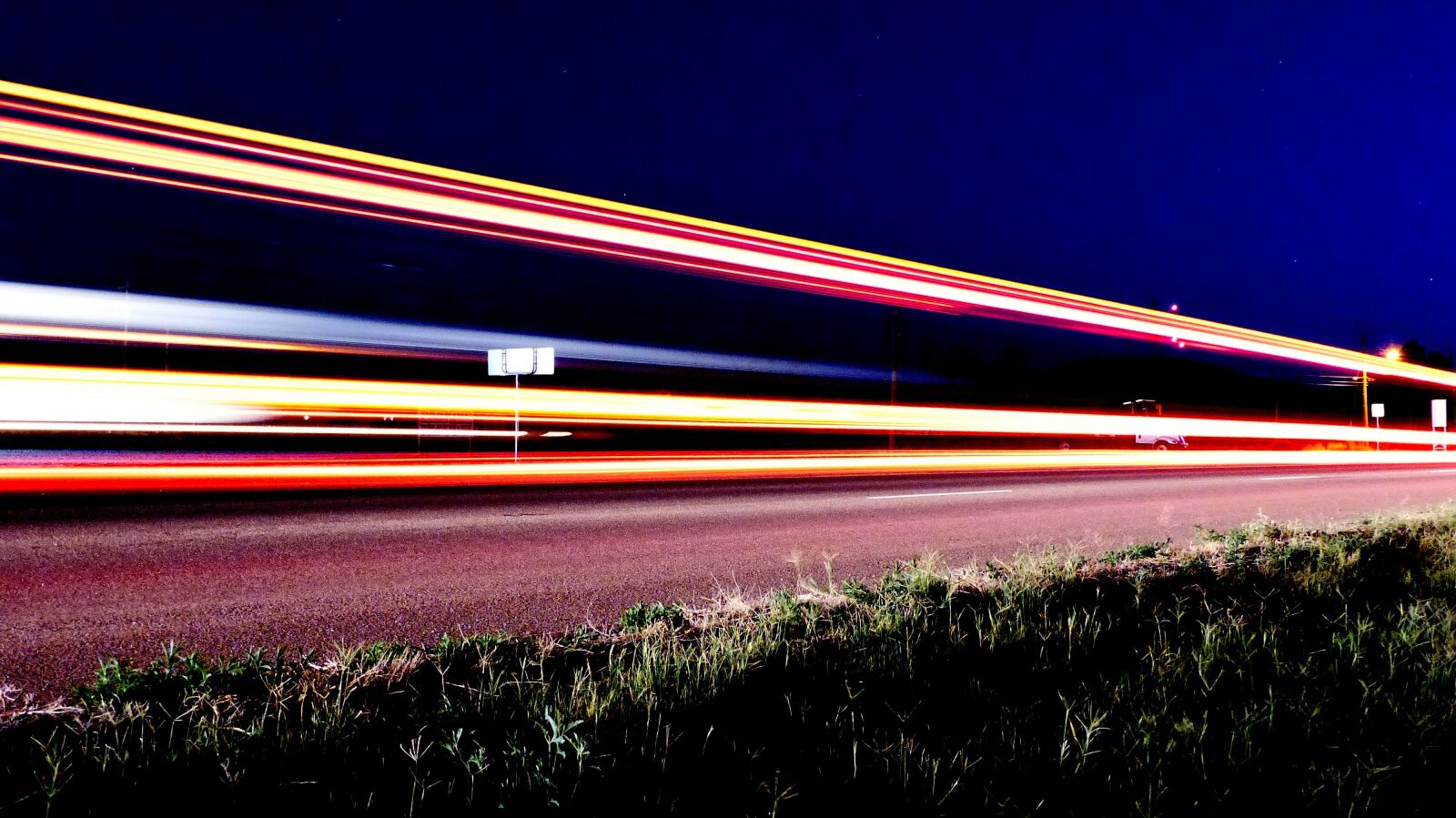 Panasonic Lumix DMC-FZ200 sample photo. Road, highway, night photography