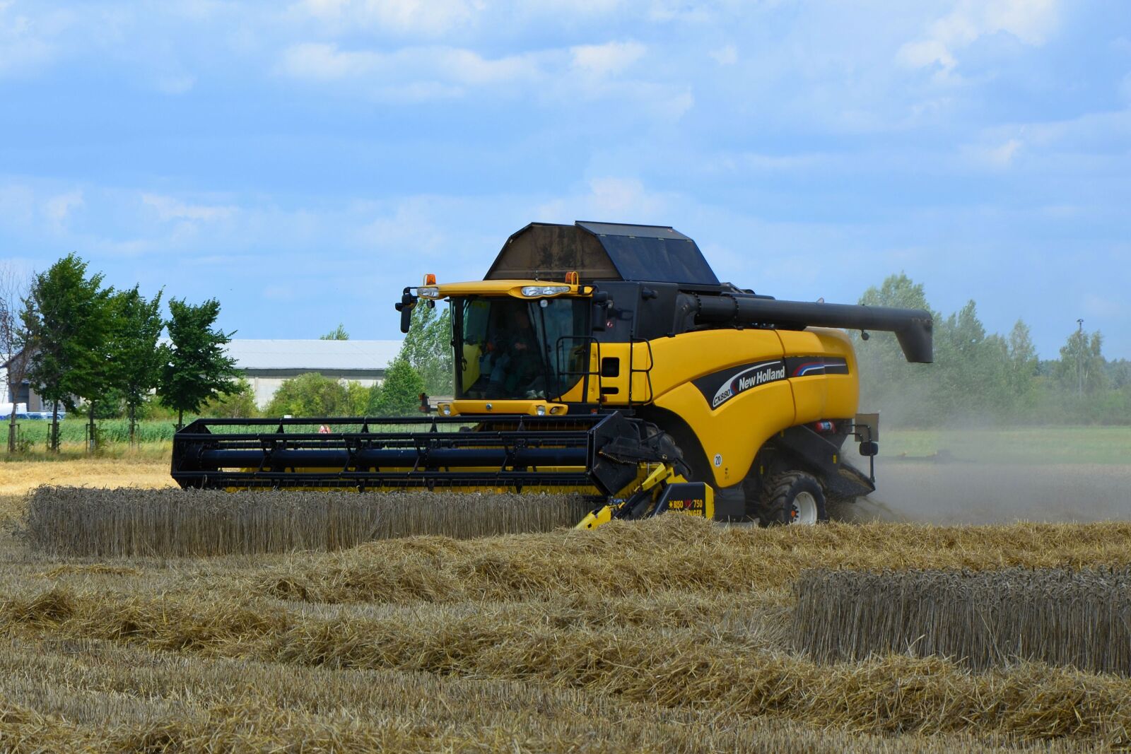 Nikon D5100 sample photo. Combine harvester, grain harvest photography