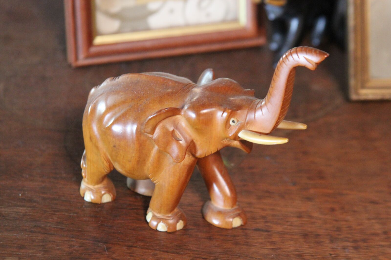 Canon EF 28-135mm F3.5-5.6 IS USM sample photo. Elephant, wood, carving photography