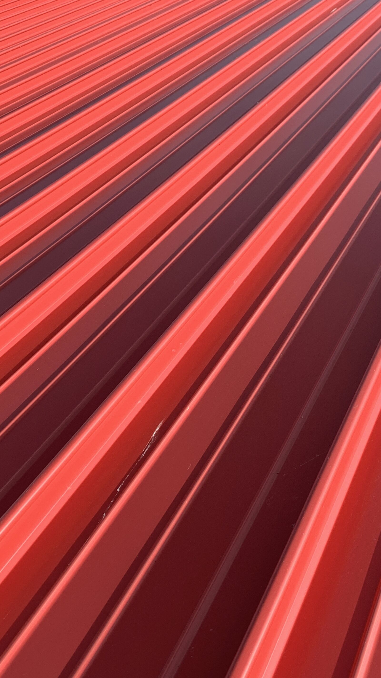 Apple iPhone XR sample photo. Wave plate, red, metal photography