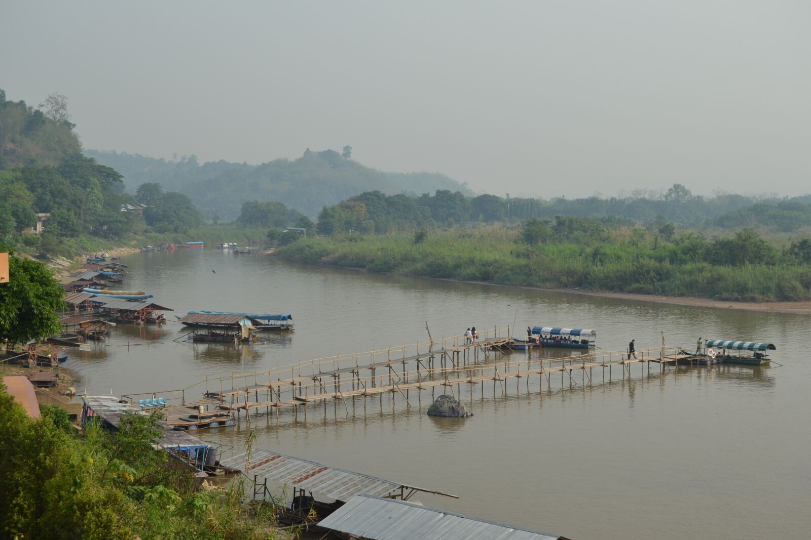 Nikon D3100 sample photo. Golden triangle, laos, boats photography
