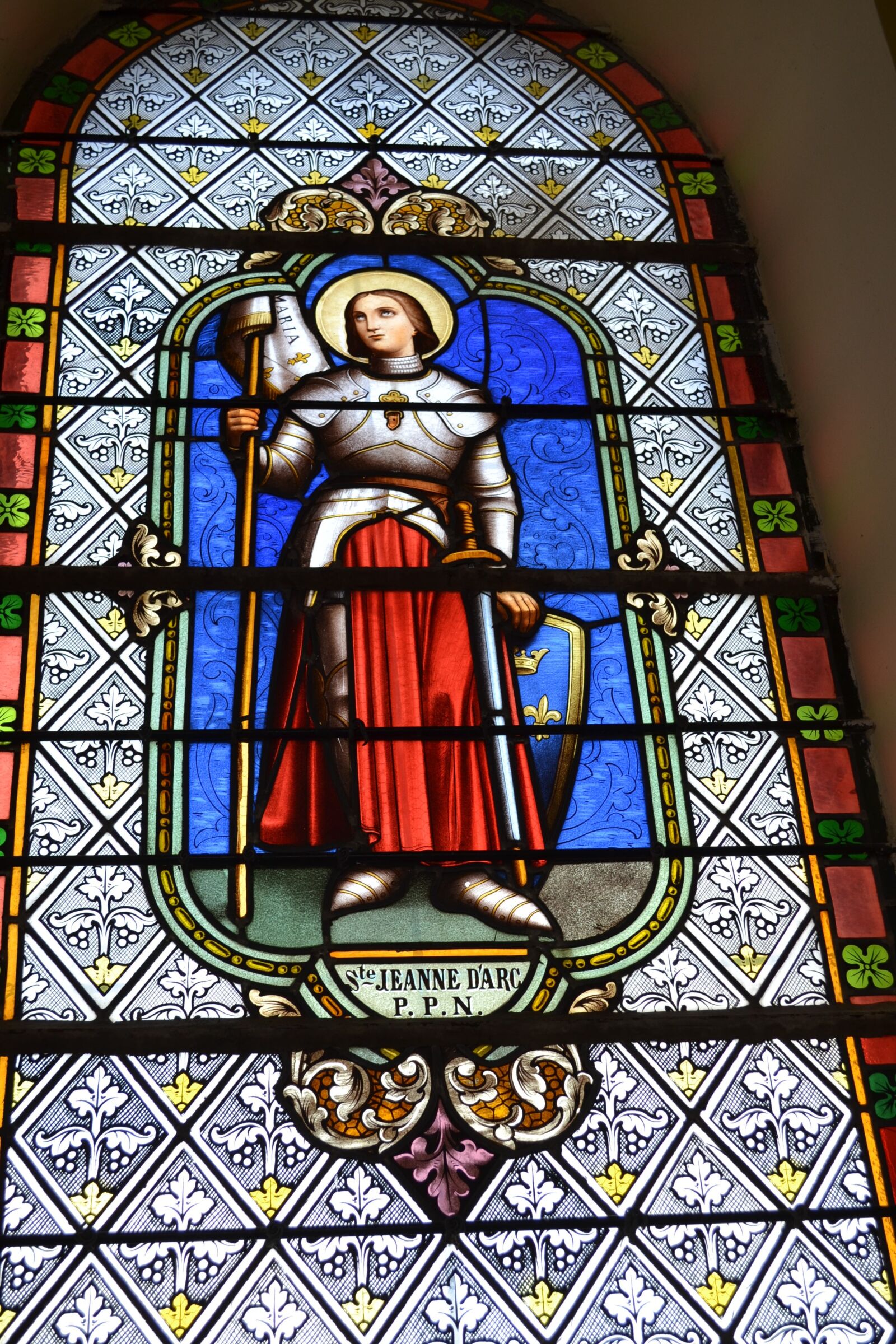 Nikon D3100 sample photo. Stained glass, colorful, woman photography