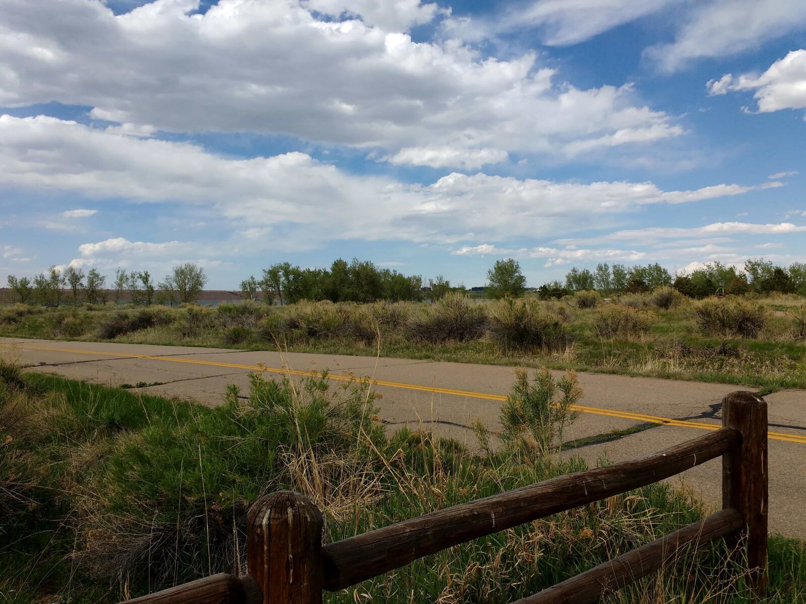 Motorola MotoG3 sample photo. Asphalt, blue sky, fence photography