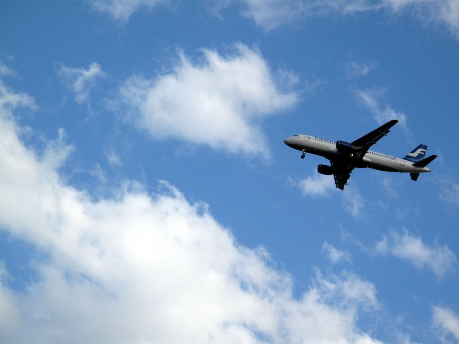 Canon PowerShot G10 sample photo. Plane, sky, cloud photography