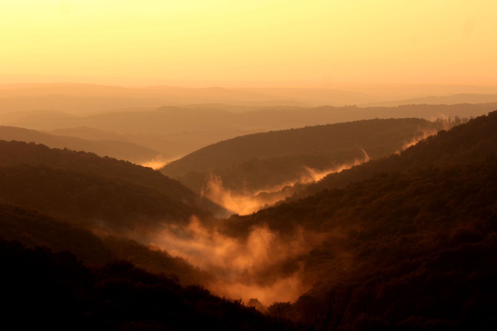 Canon EF 75-300mm f/4-5.6 sample photo. Mountains, sunset, haze photography