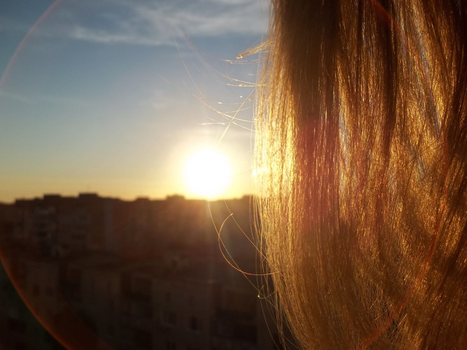 Kodak EASYSHARE C183 DIGITAL CAMERA sample photo. Sunset, hair, city photography