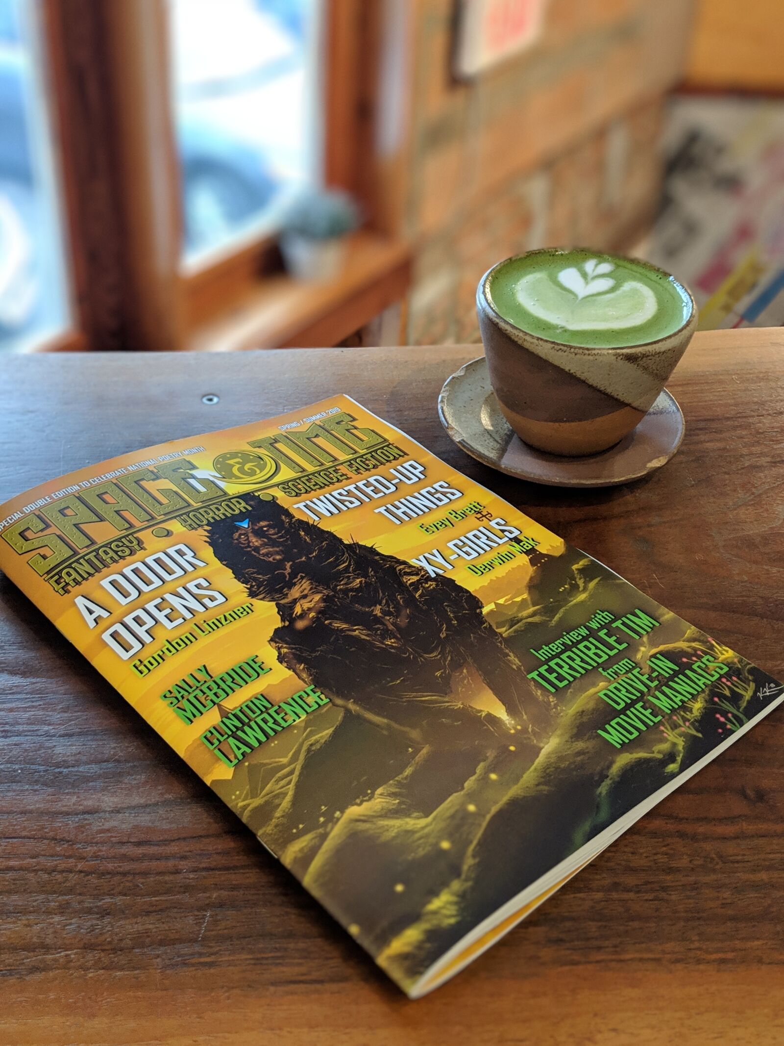 Google Pixel 2 sample photo. Magazine, cafe, read photography