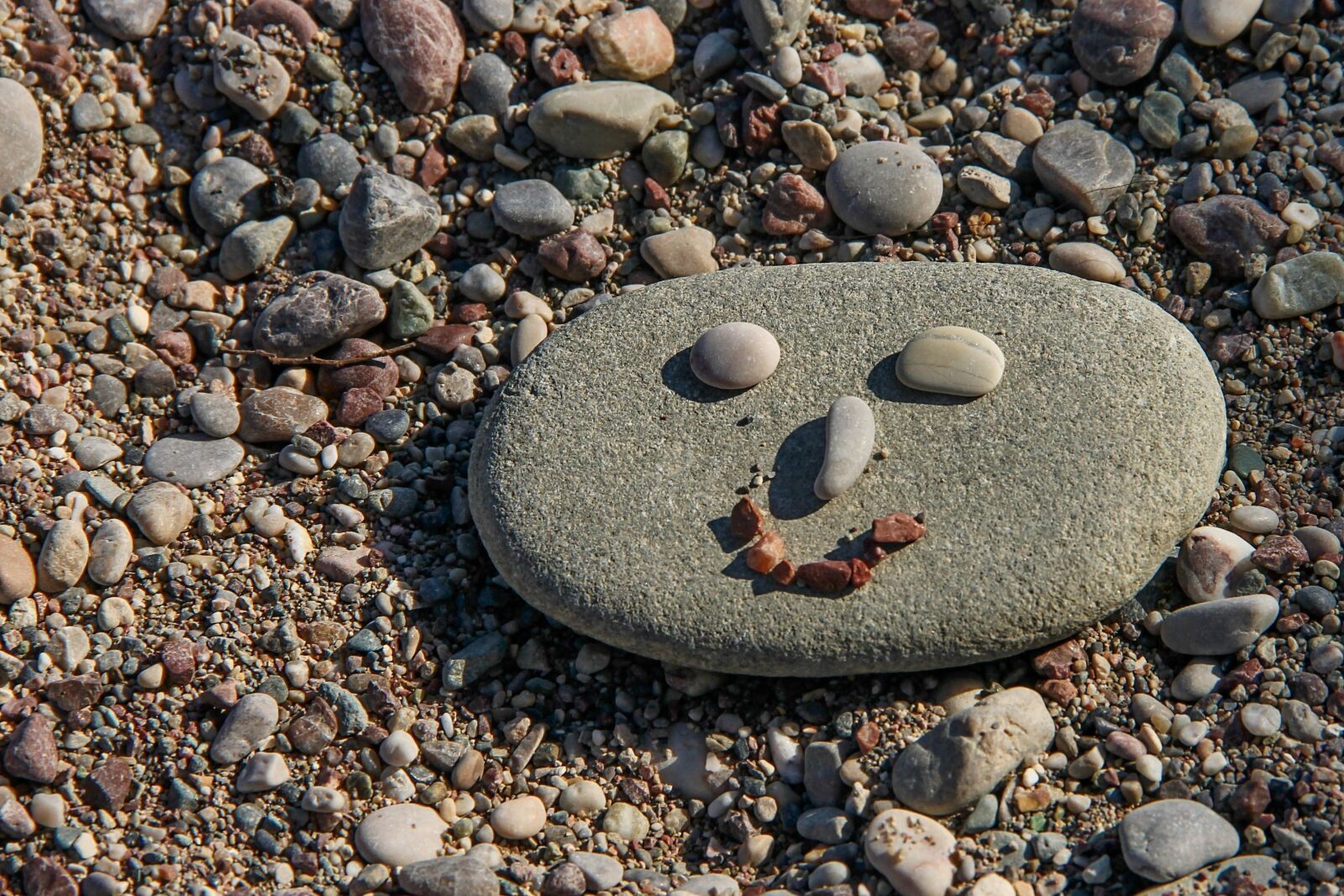 Canon EOS 1100D (EOS Rebel T3 / EOS Kiss X50) + Canon EF-S 18-135mm F3.5-5.6 IS sample photo. Face, stone face, stones photography