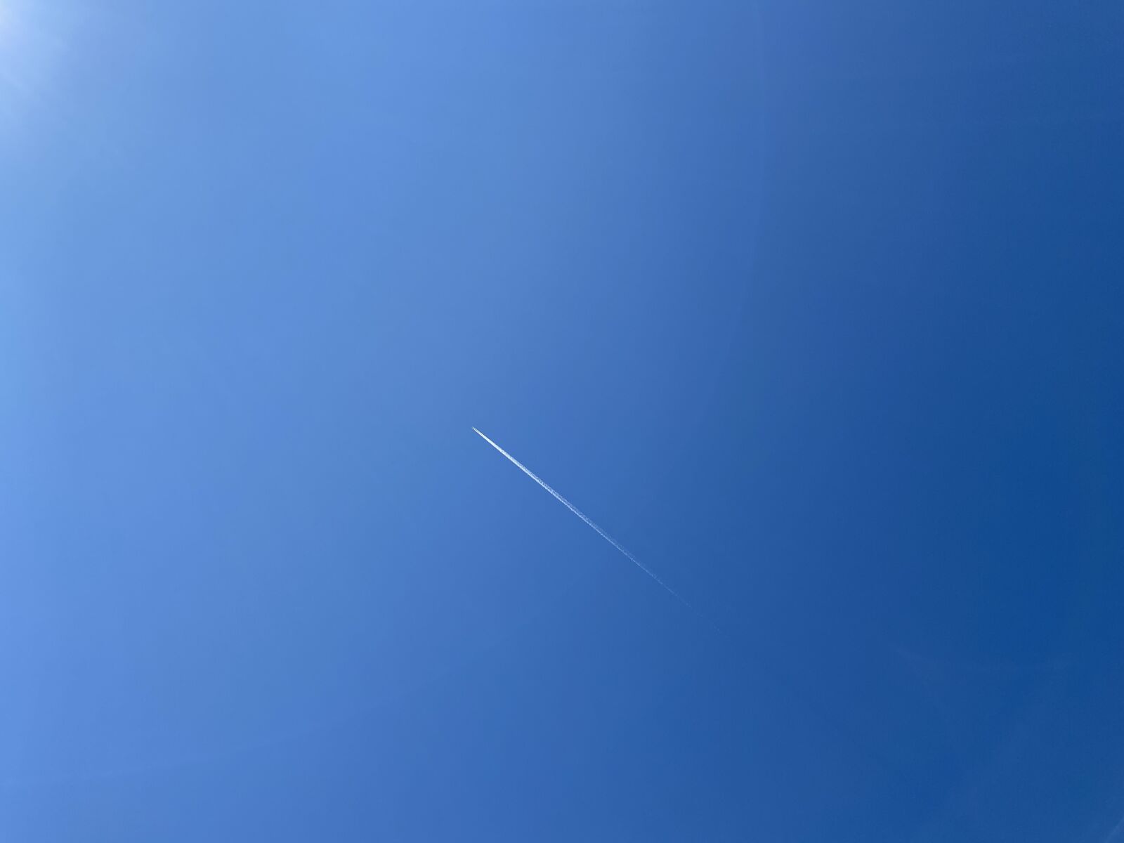 Apple iPhone 11 sample photo. Blue, sun, sky photography