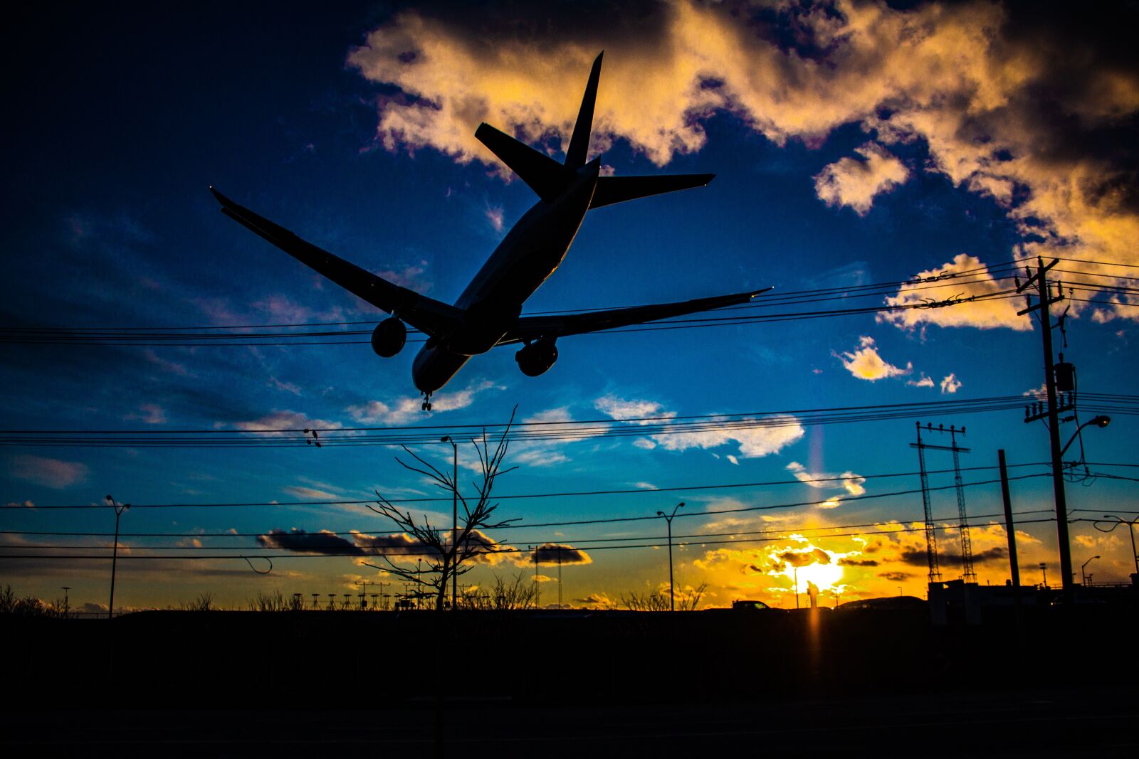 Canon EOS 60D + Canon EF-S 18-55mm F3.5-5.6 IS II sample photo. Airport, sunset, aircraft photography
