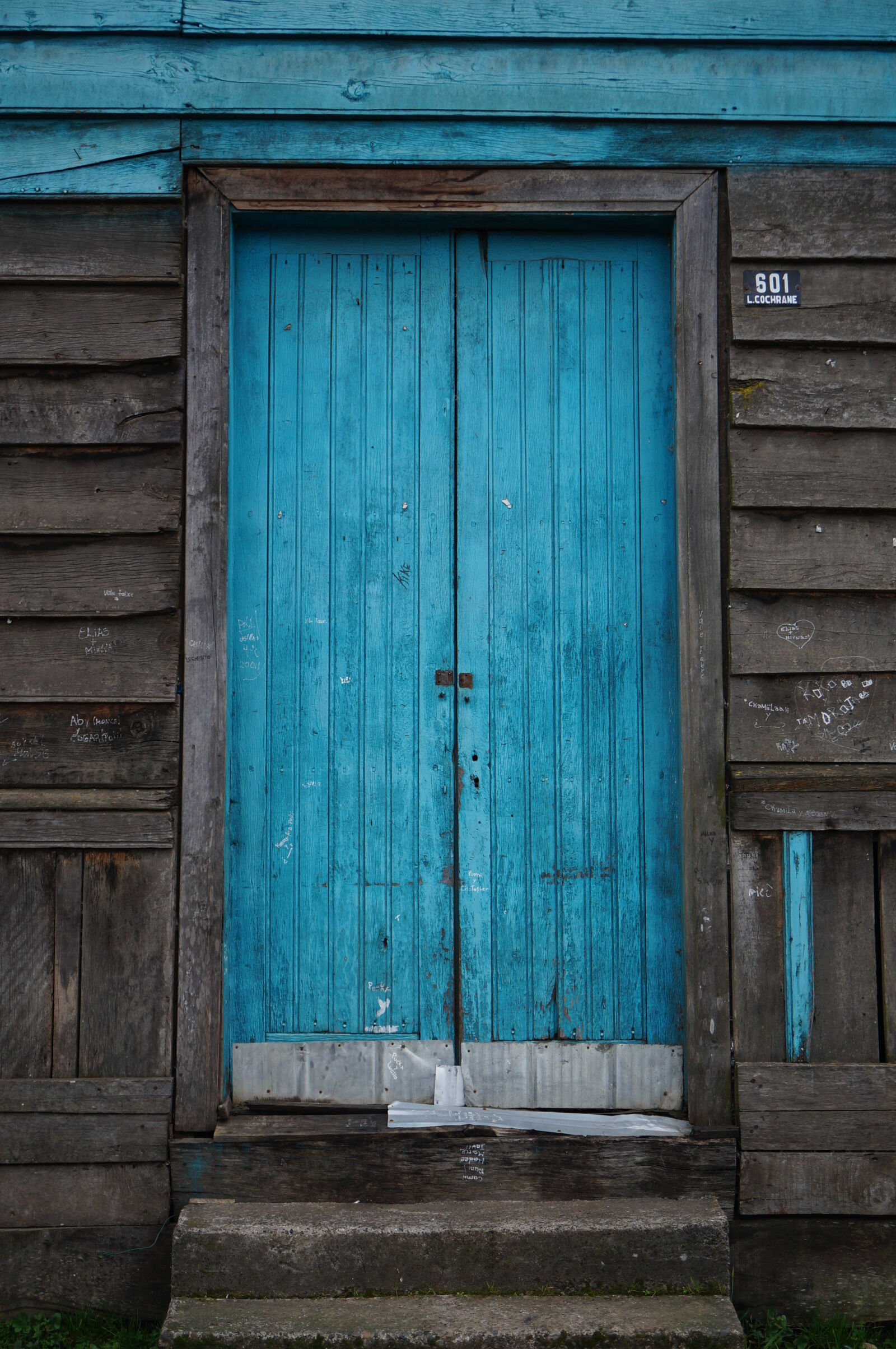 Sony E 18-50mm F4-5.6 sample photo. Blue, door, entrance, rustic photography