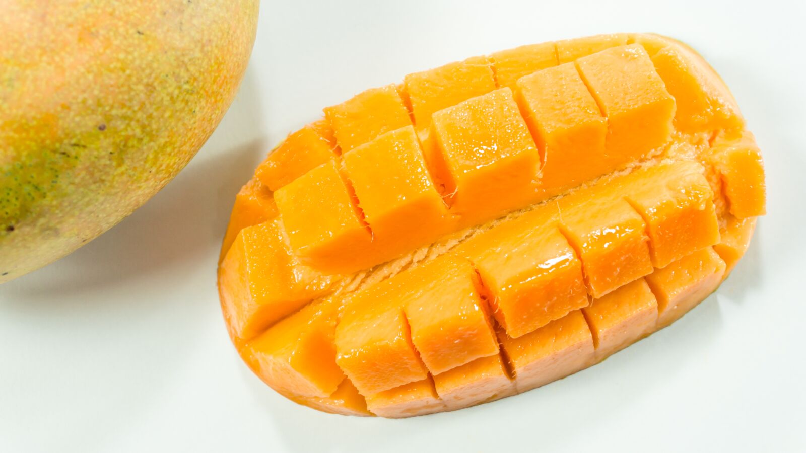Sony a5100 sample photo. Mango, slice, white photography