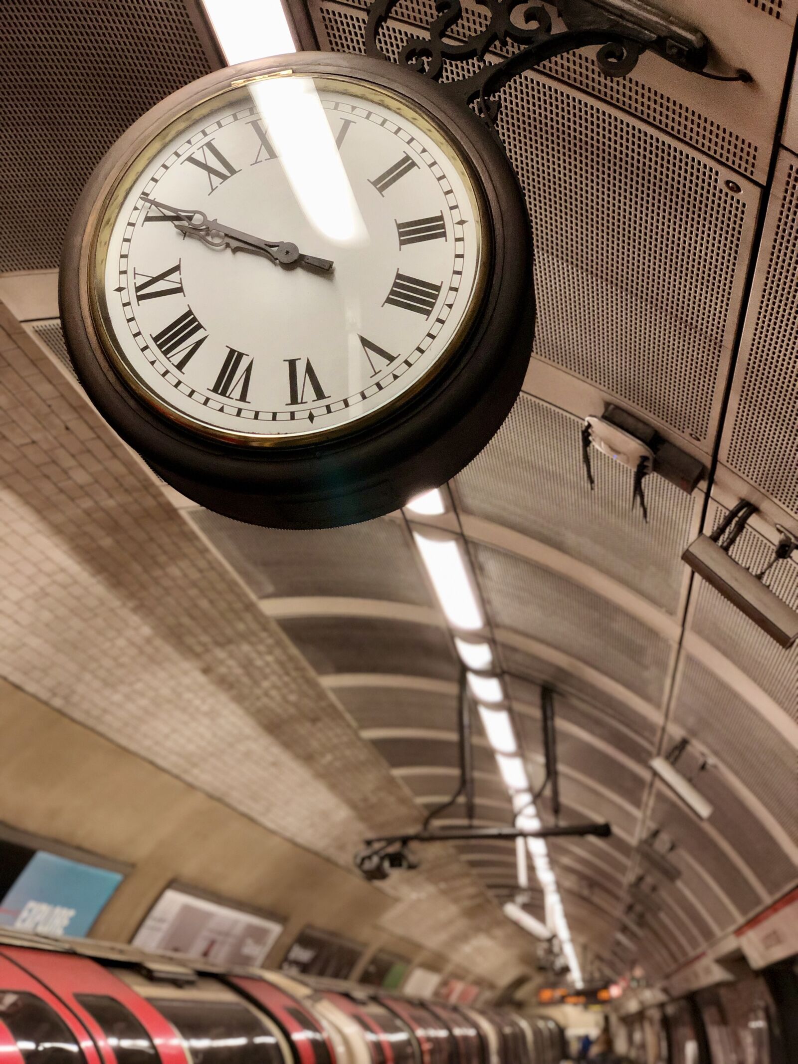 iPhone X back dual camera 6mm f/2.4 sample photo. Watch, subway, london photography