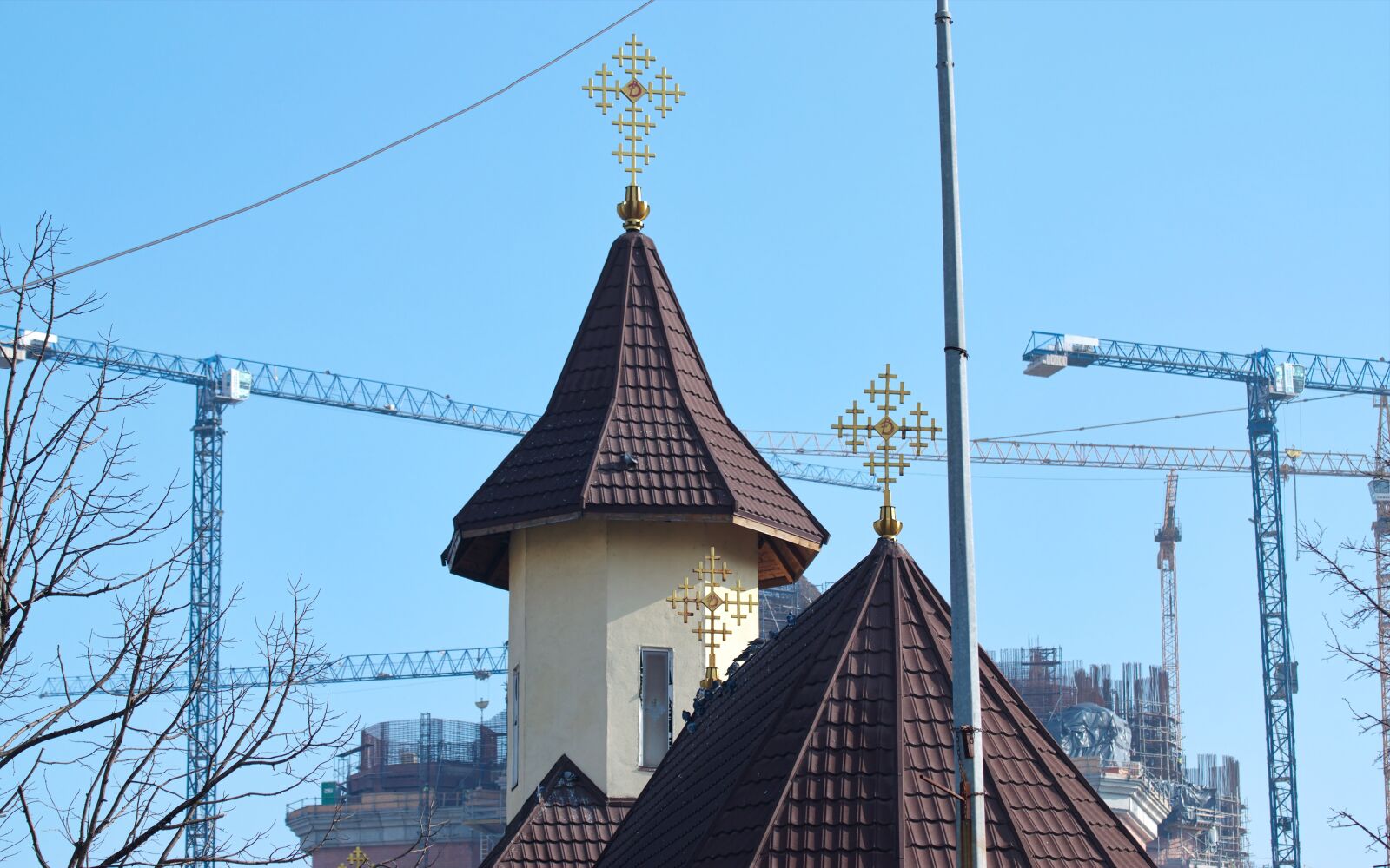 Nikon D5300 sample photo. The towers, cross, church photography