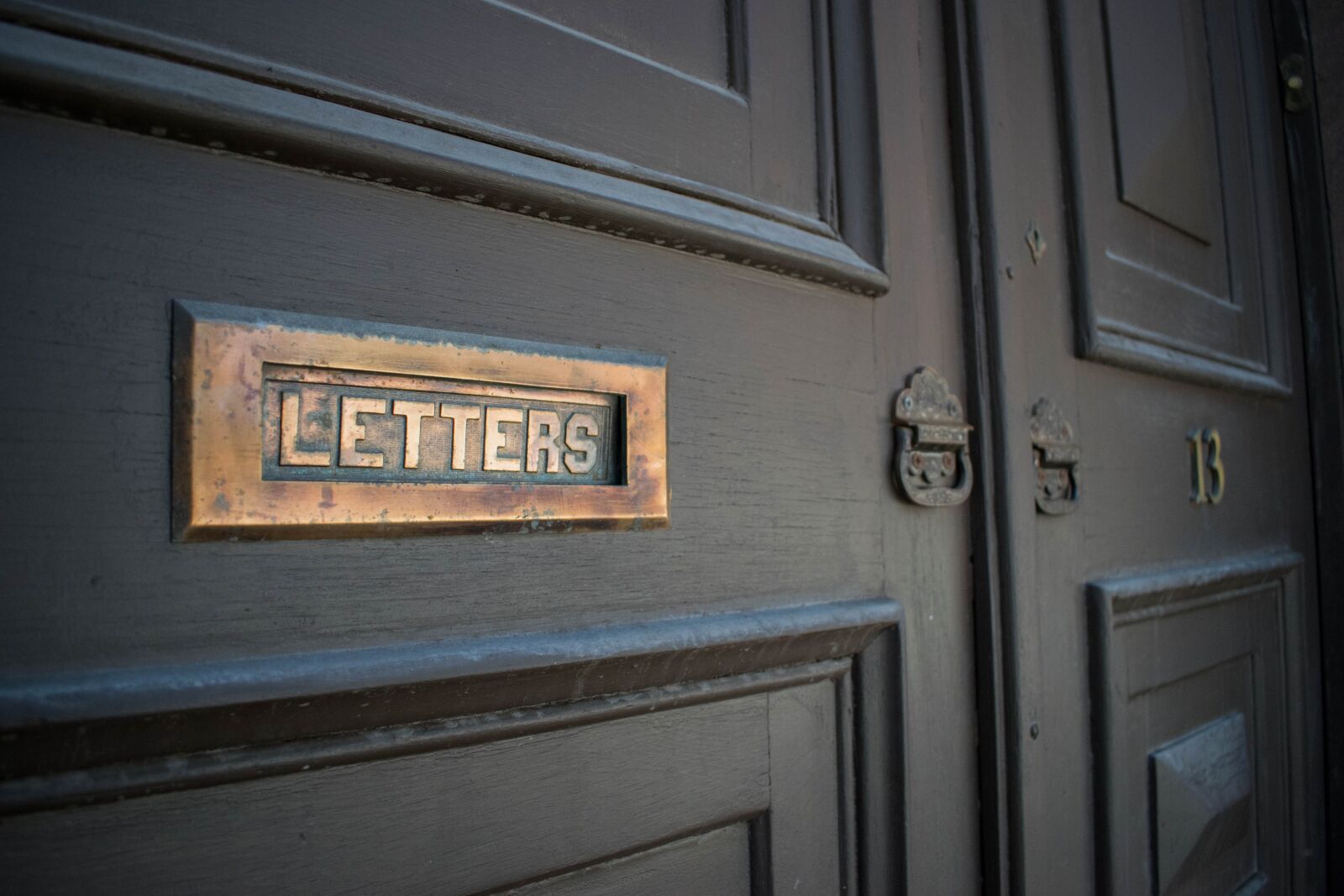 Nikon D3300 sample photo. Letters, door, city photography