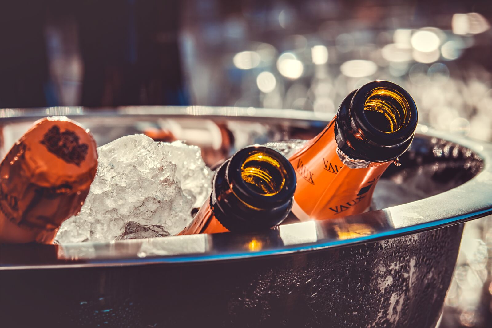 Fujifilm XF 55-200mm F3.5-4.8 R LM OIS sample photo. Champagne, champagne bottles, ice photography