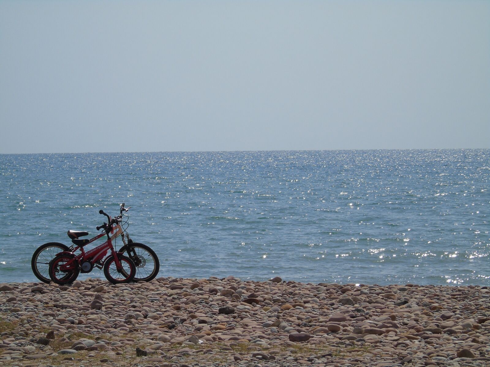 Sony Cyber-shot DSC-H400 sample photo. Beach, bicycles, holiday photography