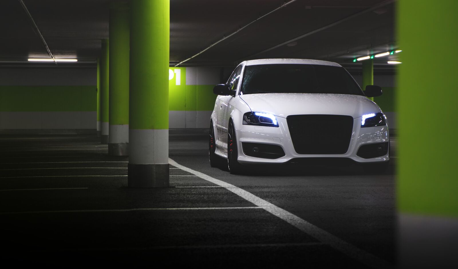 Sony a6500 + Sony E PZ 18-105mm F4 G OSS sample photo. Parking lot, audi, car photography
