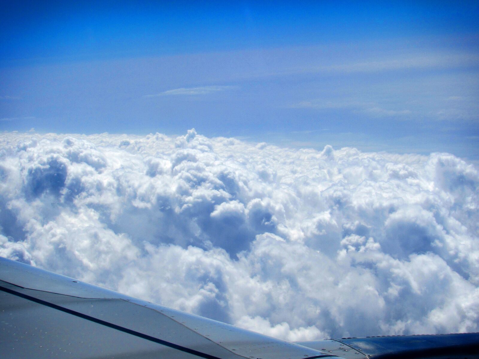 Canon PowerShot SX530 HS sample photo. Clouds, flying, plane photography