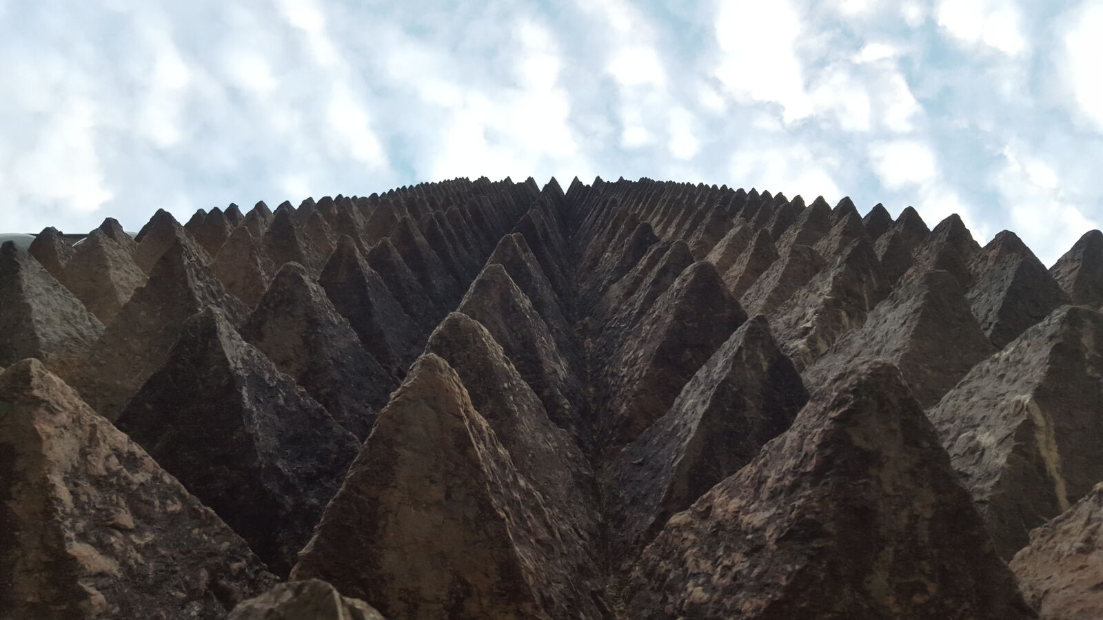 Samsung Galaxy S6 sample photo. Carved, stones, cloudy, sky photography