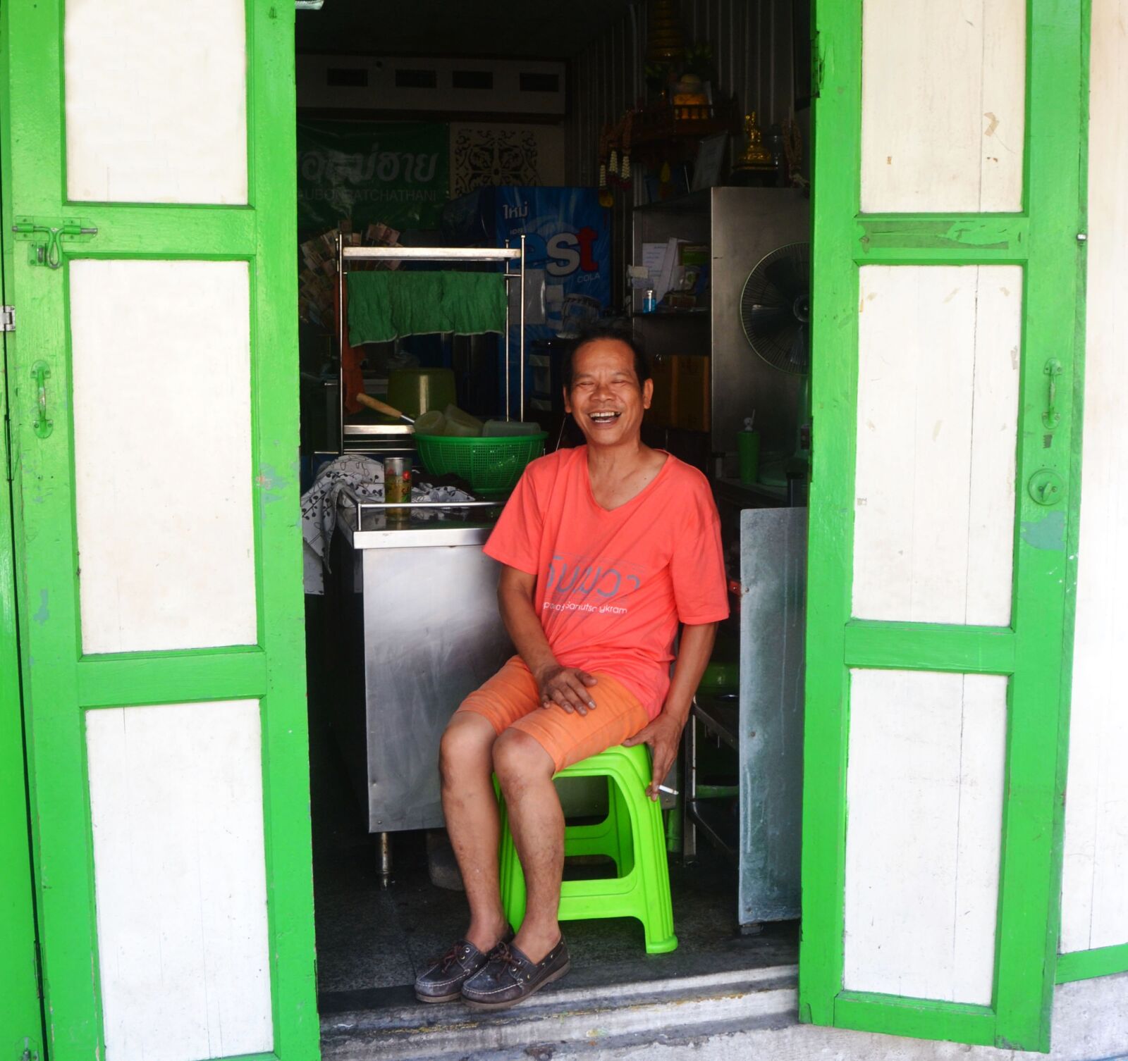 Nikon D3100 sample photo. Open doorway, doors, man photography