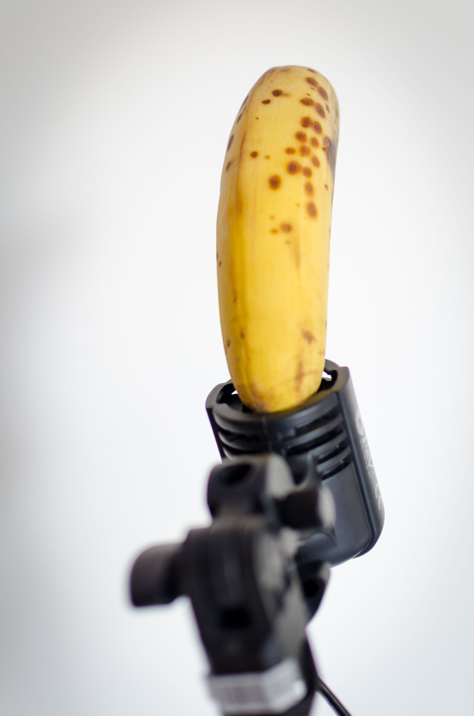 Nikon AF-S DX Nikkor 35mm F1.8G sample photo. Banana, humor, light, photography photography