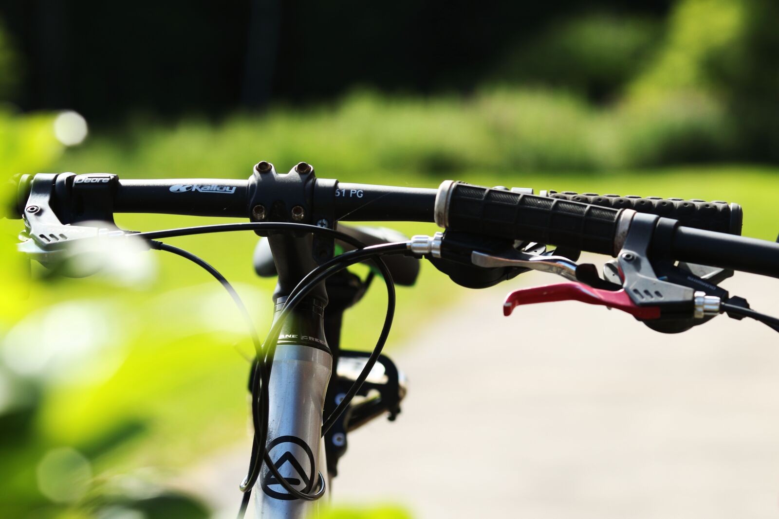 Canon EOS 7D Mark II + Canon EF 135mm F2L USM sample photo. Bike, steering wheel, bicycle photography
