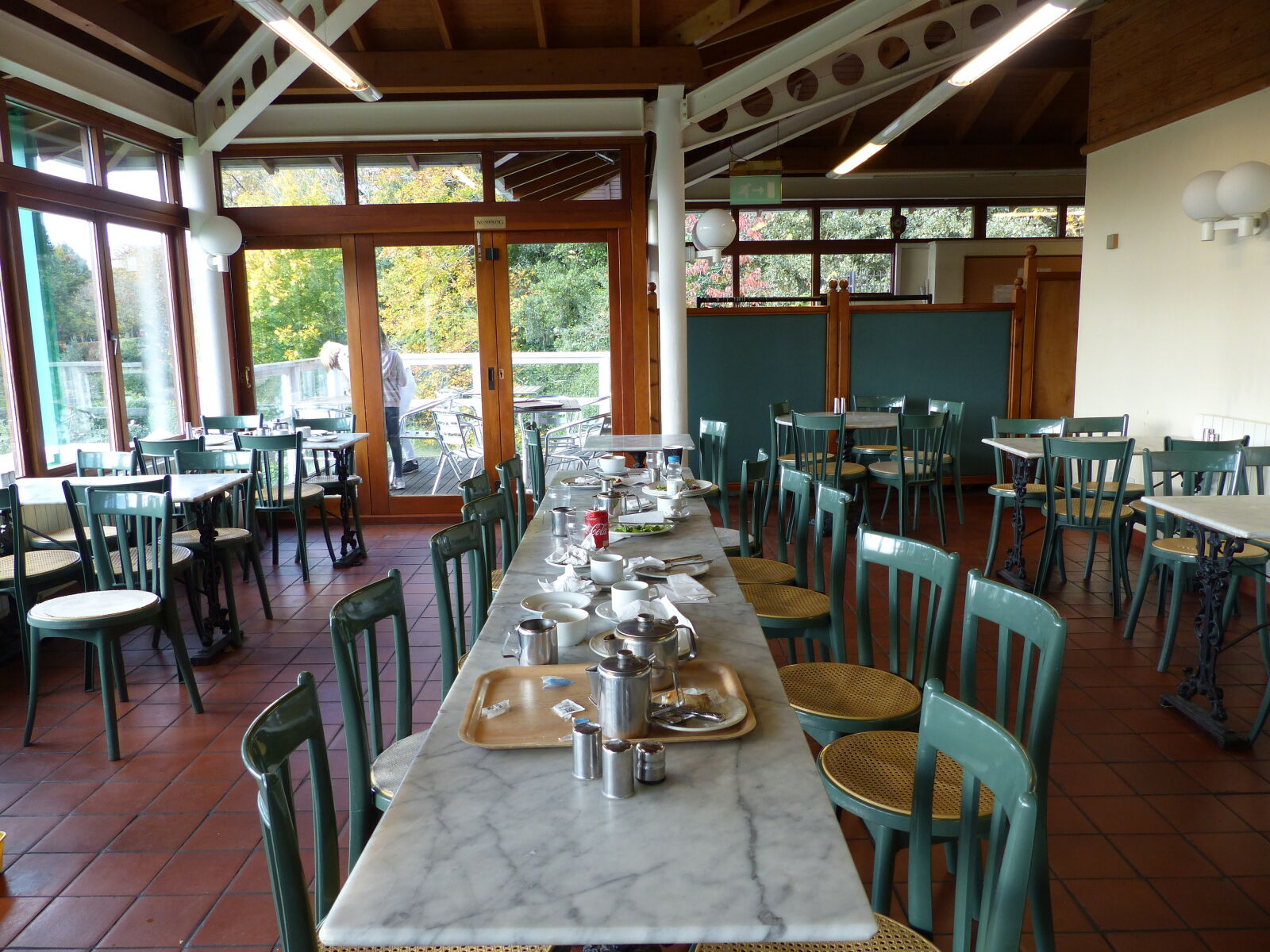 Panasonic Lumix DMC-FZ200 sample photo. Abandoned, cafe, chairs, cleaning photography