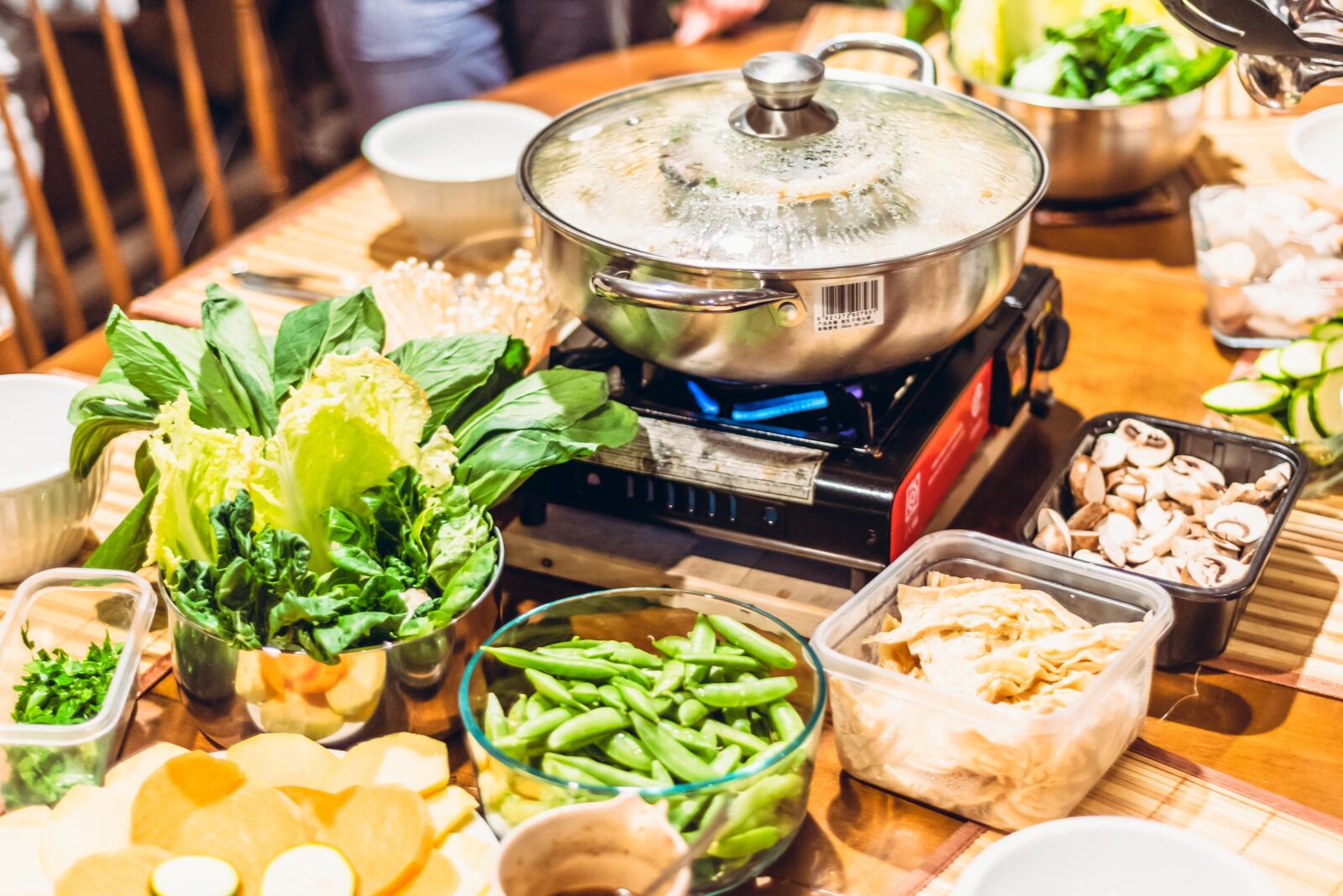 Nikon D750 sample photo. Hot pot, table, veggies photography