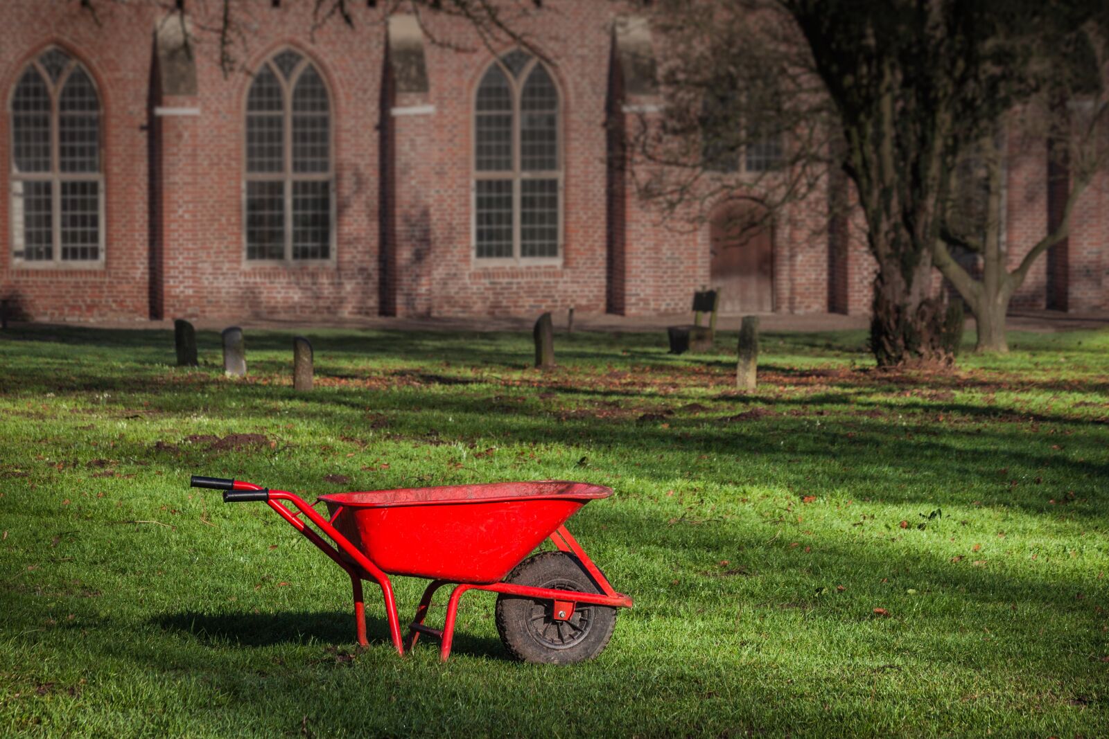 Canon EF 70-300mm F4-5.6 IS USM sample photo. Red, wheelbarrow, grass photography