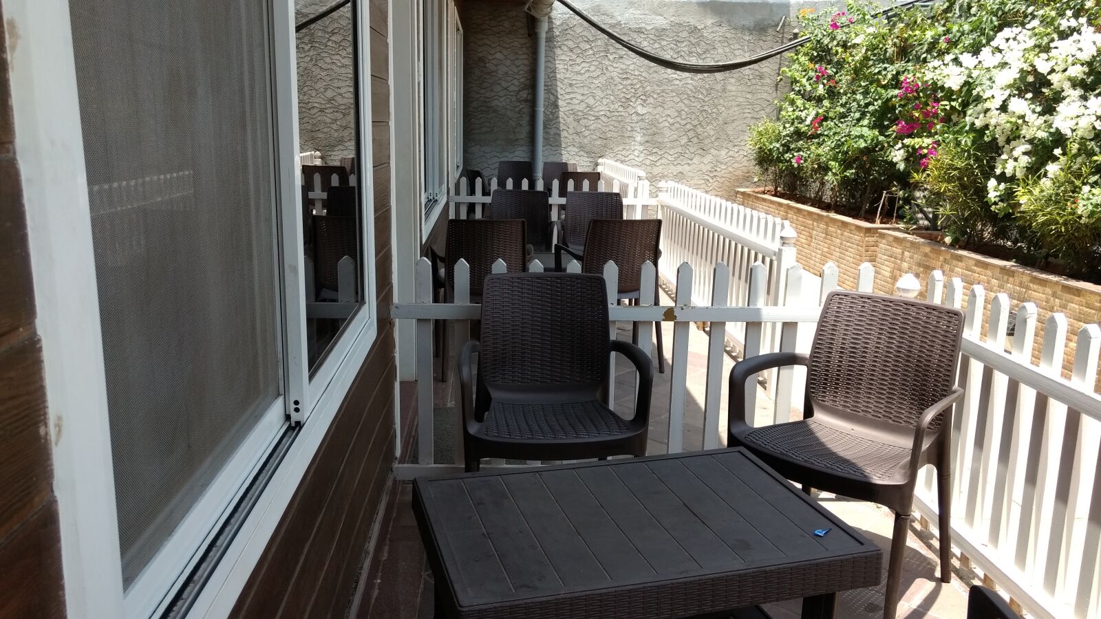 Motorola Moto G (4) sample photo. Lounge, chairs, picket, fence photography