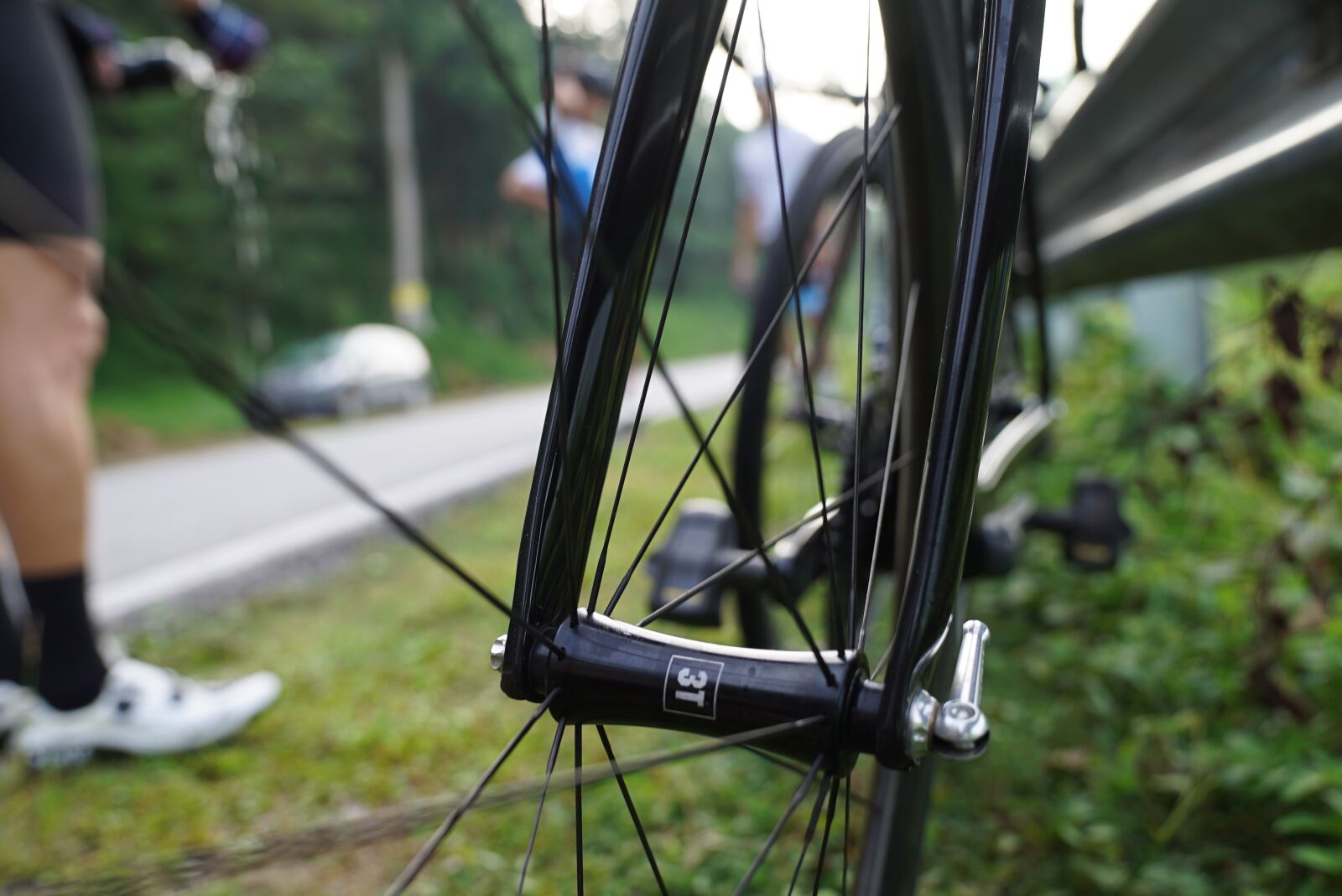 Sony a7S + Sony FE 24-70mm F2.8 GM sample photo. Bicycle, parked, guard rails photography