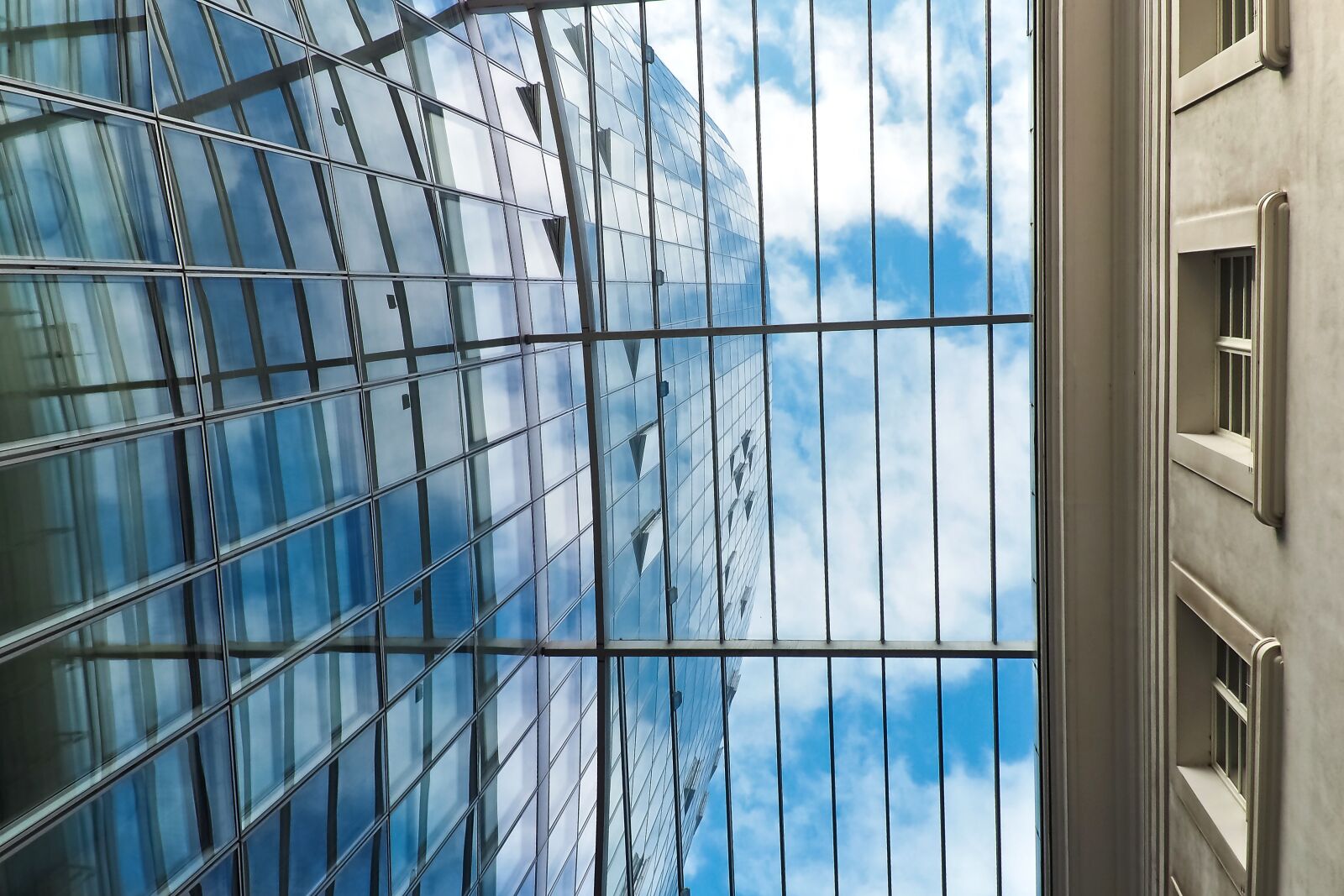 Olympus OM-D E-M10 sample photo. Architecture, skyscraper, glass facades photography