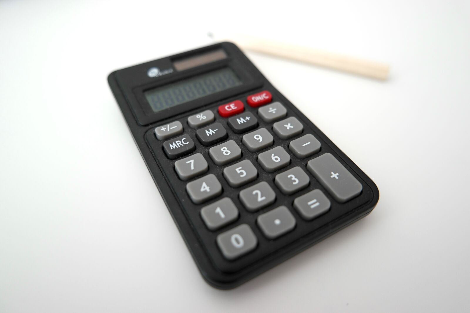 Samsung NX500 sample photo. Calculator, pencil, office photography