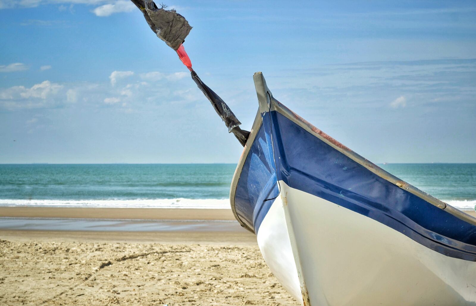 Nikon D3100 sample photo. Sea, boat, sand photography