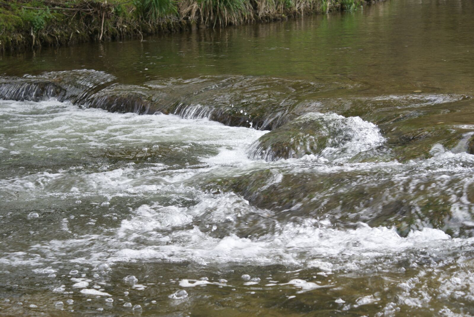 Sony Alpha DSLR-A100 sample photo. Bach, water, stone photography