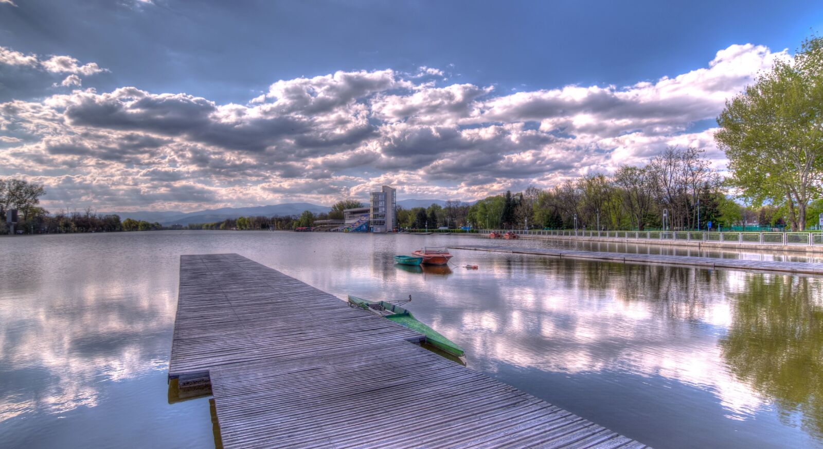 Tokina AT-X Pro 11-16mm F2.8 DX II sample photo. Reflection, river, water, wood photography
