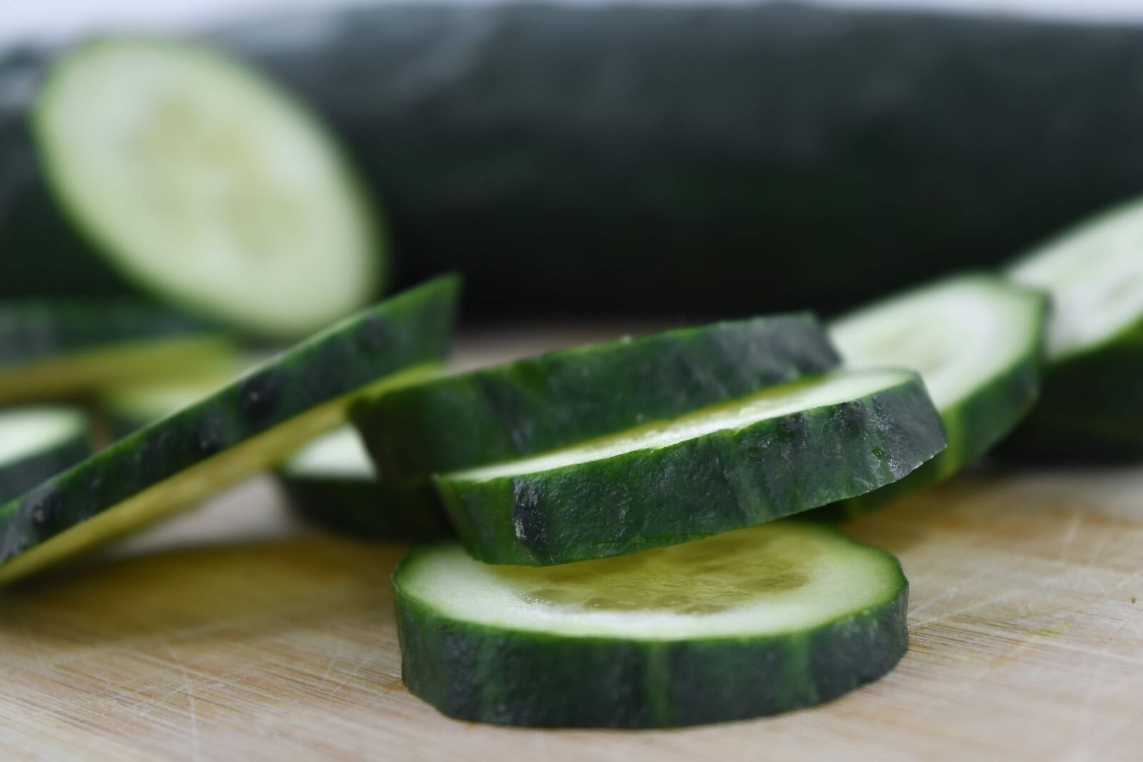 Nikon D5500 sample photo. Cross section, cucumber, slices photography
