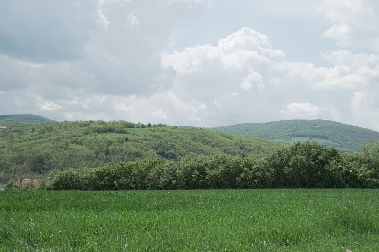 Sony a6500 + Sony E 35mm F1.8 OSS sample photo. Landscape, clouds, hills photography