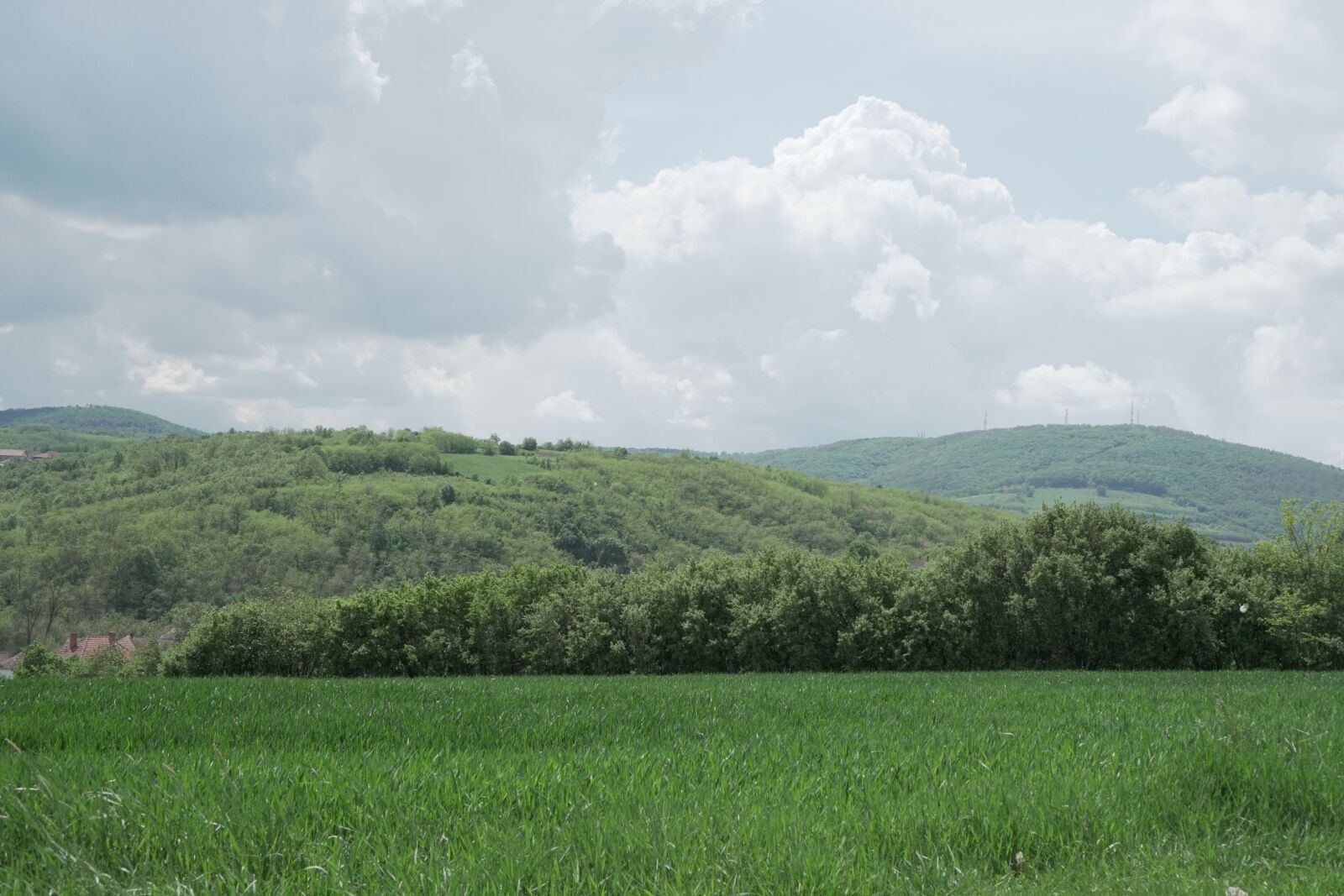 Sony a6500 sample photo. Landscape, clouds, hills photography