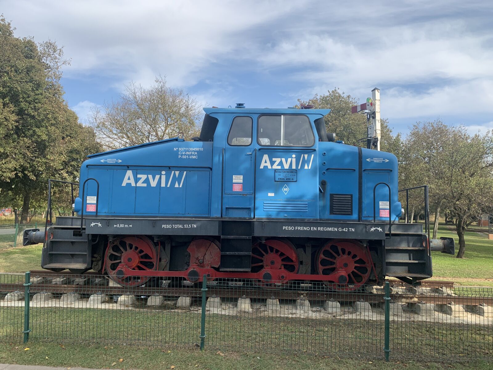 iPhone XS Max back dual camera 4.25mm f/1.8 sample photo. Train, park, blue photography