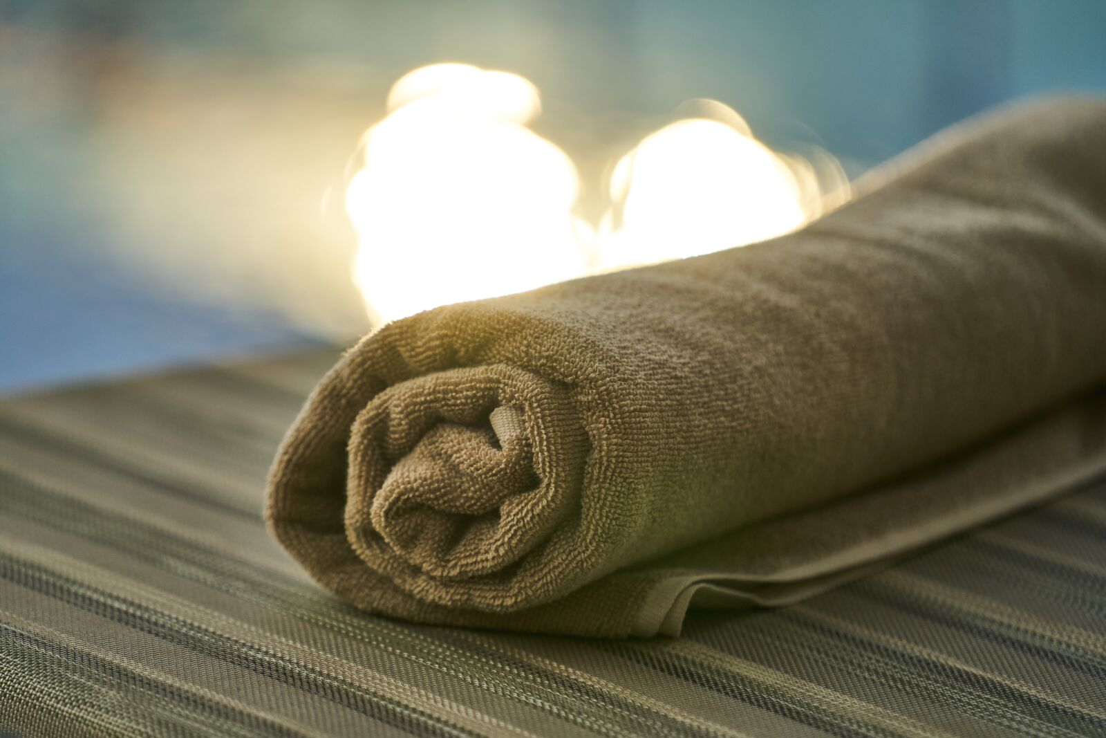 Sony FE 70-200mm F4 G OSS sample photo. Pool, towel, hotel photography