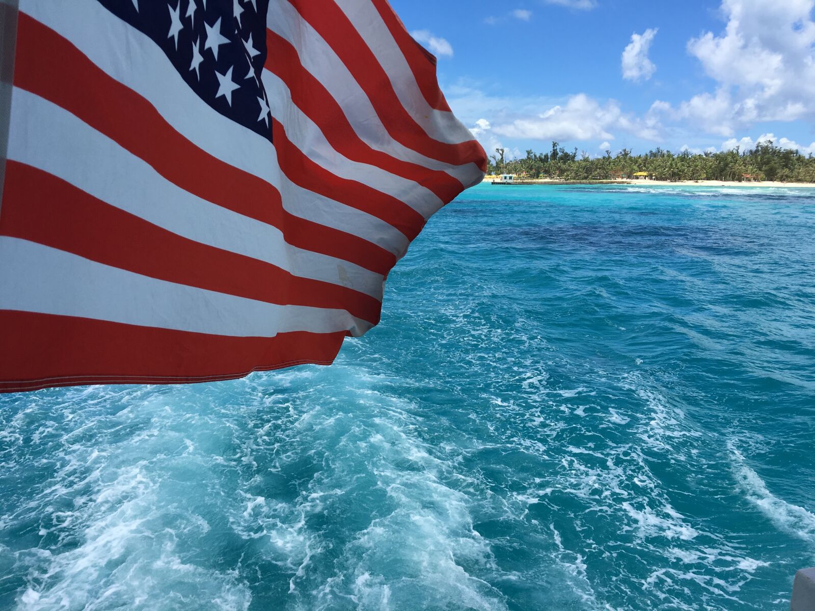 Apple iPhone 6s sample photo. American flag, the waves photography