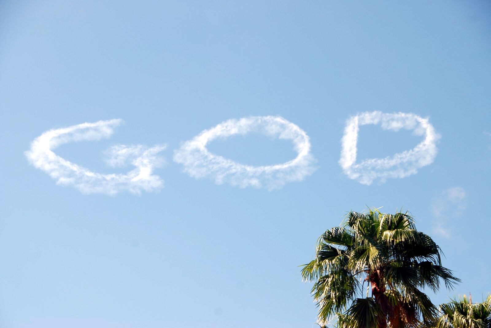 Nikon D200 sample photo. Sky writing, text, sky photography