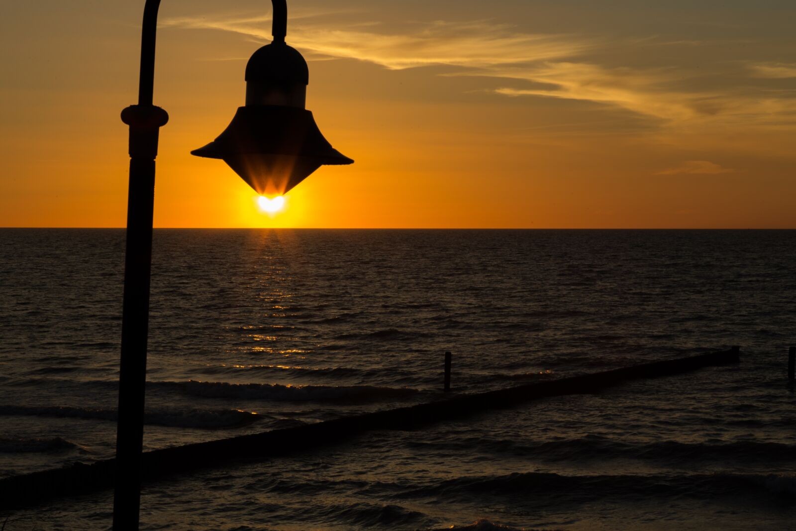 Canon EOS 6D + Canon EF 24-105mm F4L IS USM sample photo. Sunset, baltic sea, lamp photography