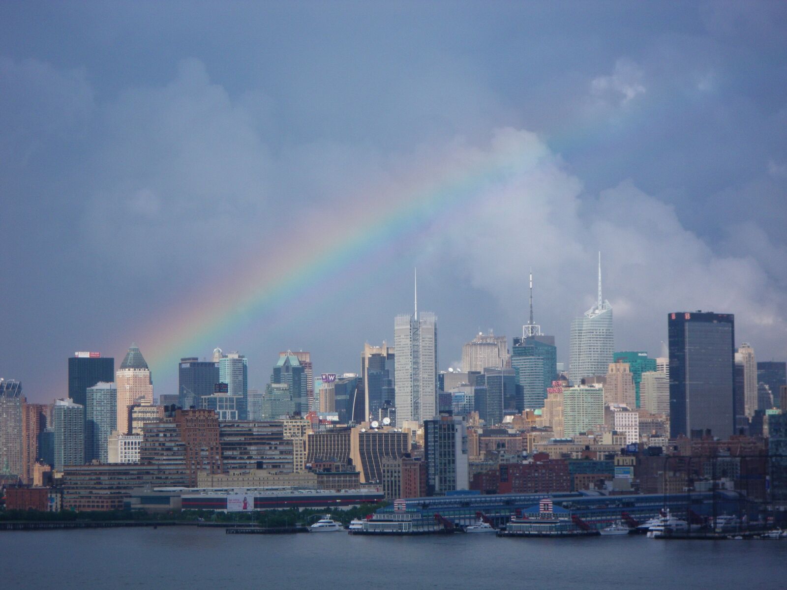 Pentax Optio P80 sample photo. Rainbow, cityscape, skyline photography