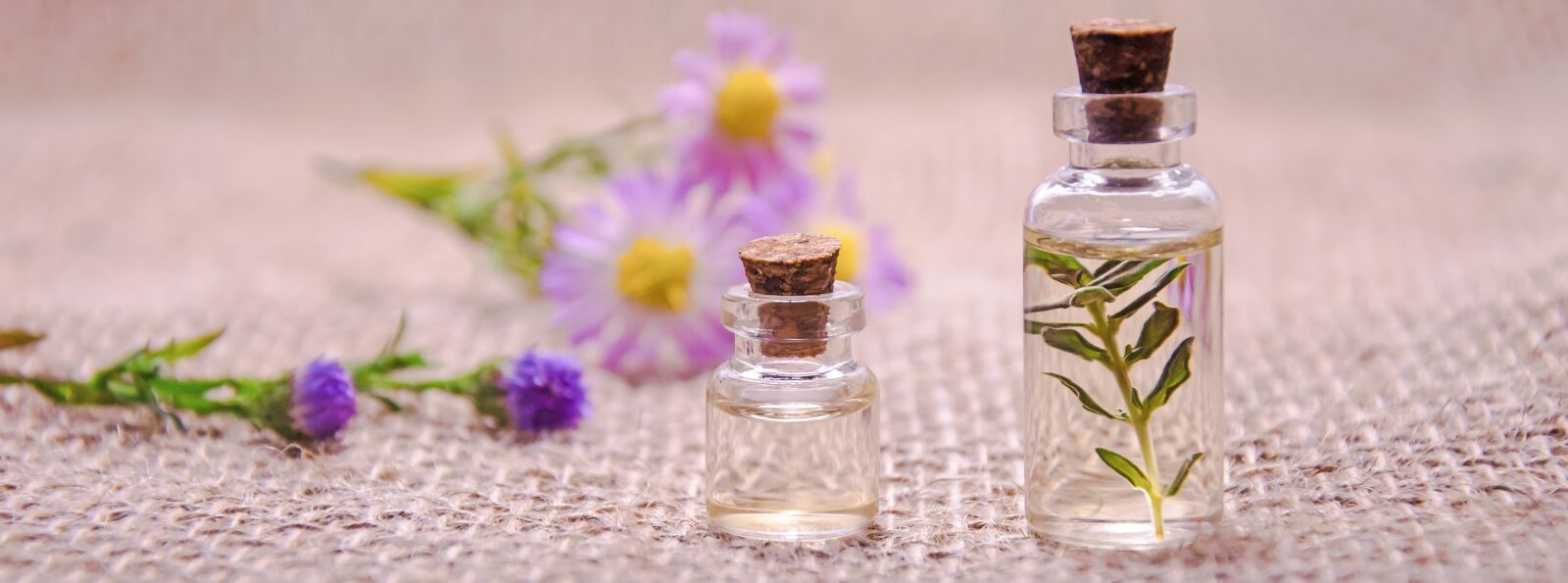 Nikon D3100 sample photo. Essential oils, flower, aromatherapy photography