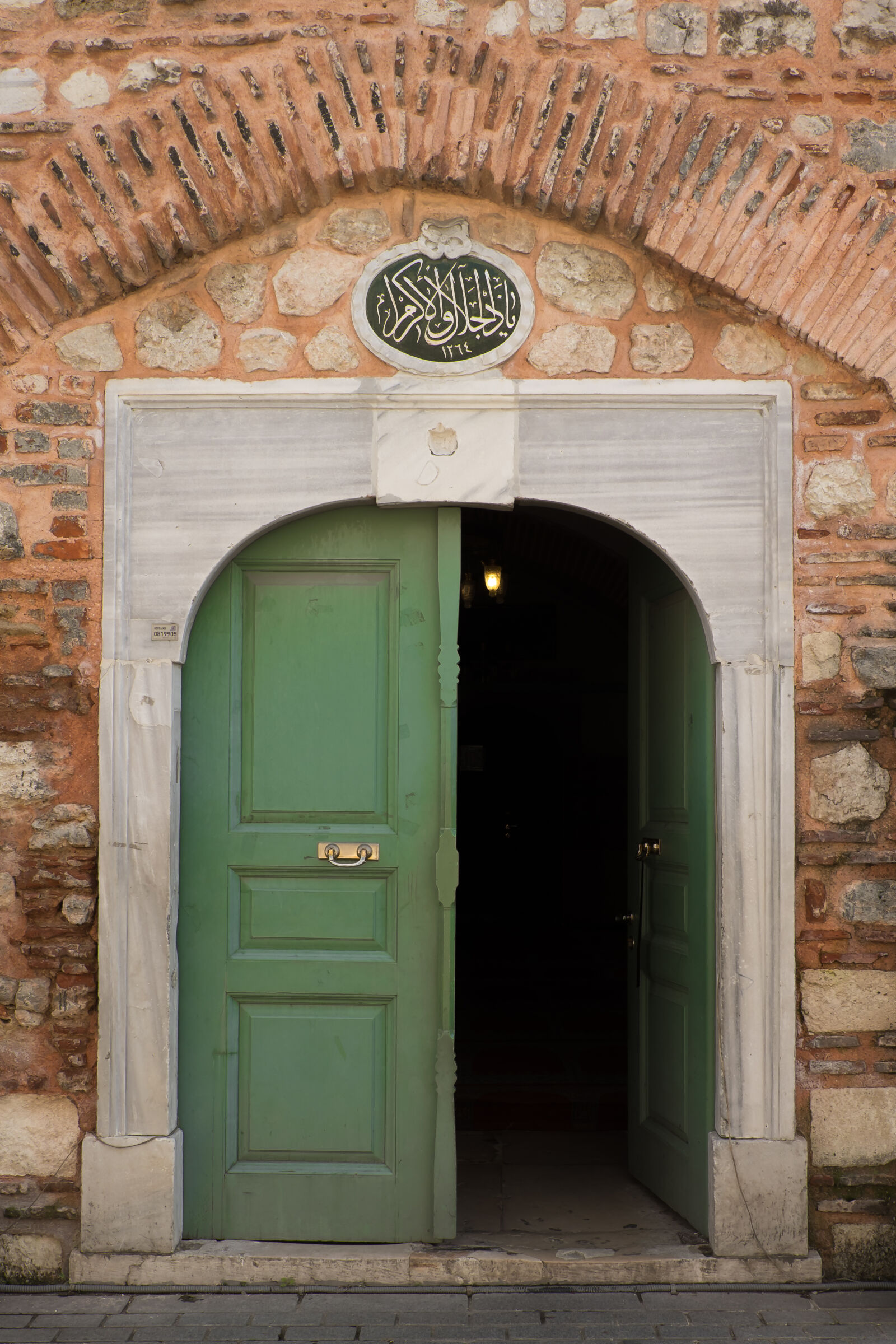Fujifilm XC 16-50mm F3.5-5.6 OIS II sample photo. Black, door, gate, green photography